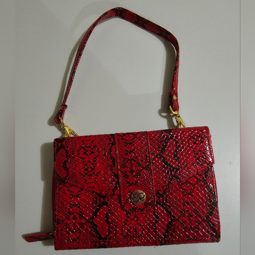 Red faux snake skin clutch with short strap